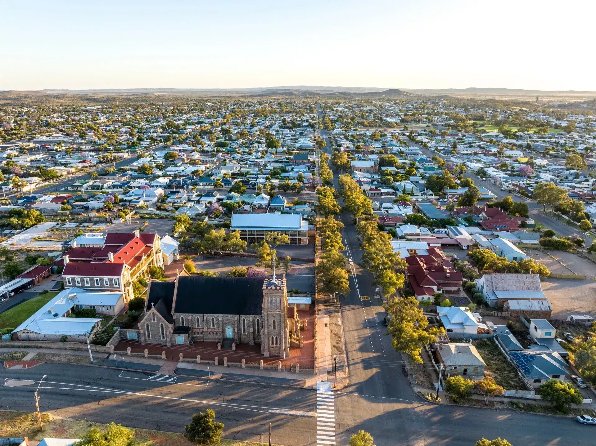 Aerial view of a city neighborhood and cathedral
